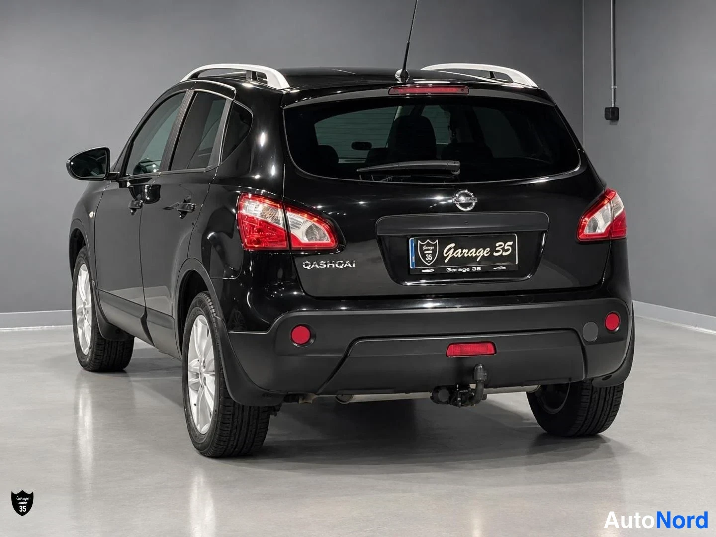 Musta Nissan Qashqai 2012, takaviisto, kuva 7