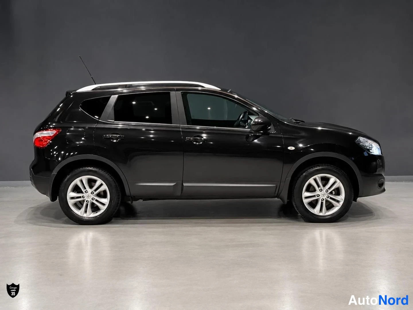 Musta Nissan Qashqai 2012, sivulta, kuva 6