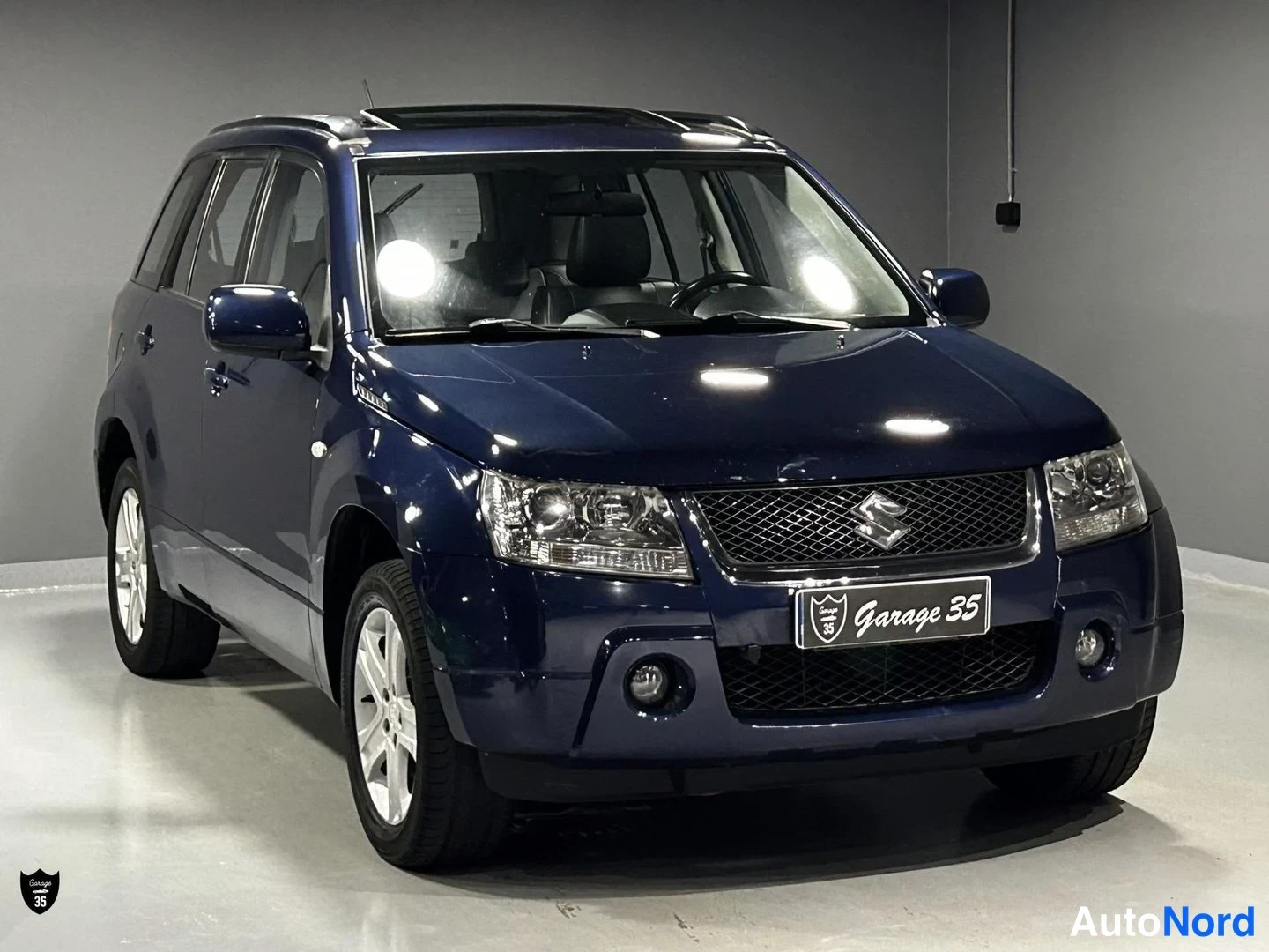 Sininen Suzuki Grand Vitara 2007, etuviisto, keula oikealle, kuva 3