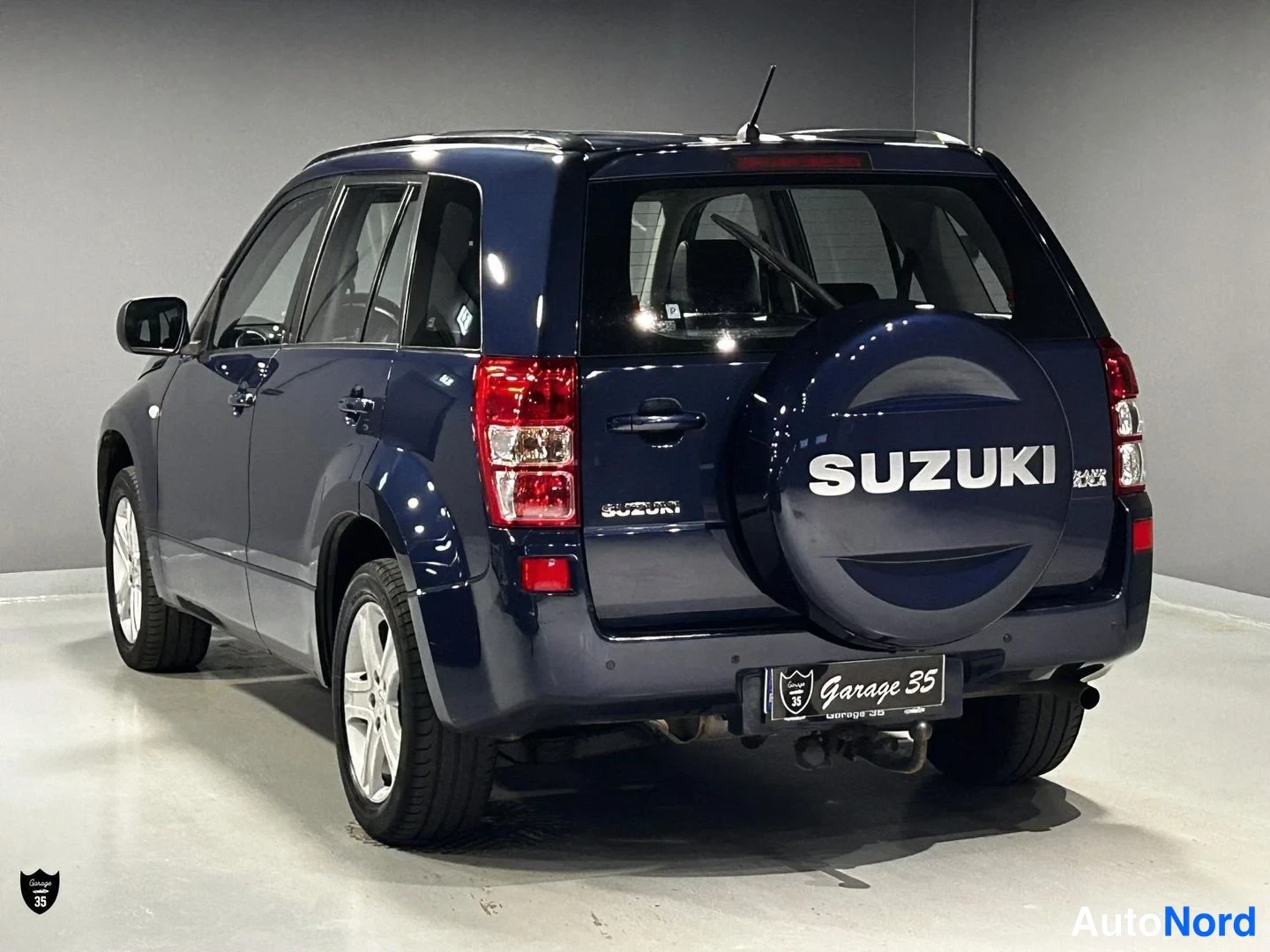 Sininen Suzuki Grand Vitara 2007, takaviisto, kuva 6