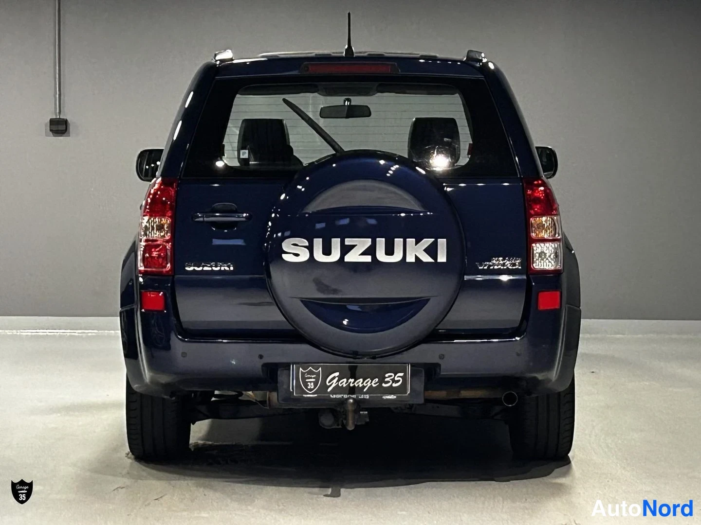 Sininen Suzuki Grand Vitara 2007, takaa, kuva 8