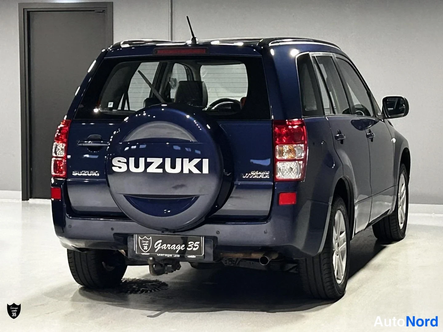 Sininen Suzuki Grand Vitara 2007, takaviisto, kuva 7