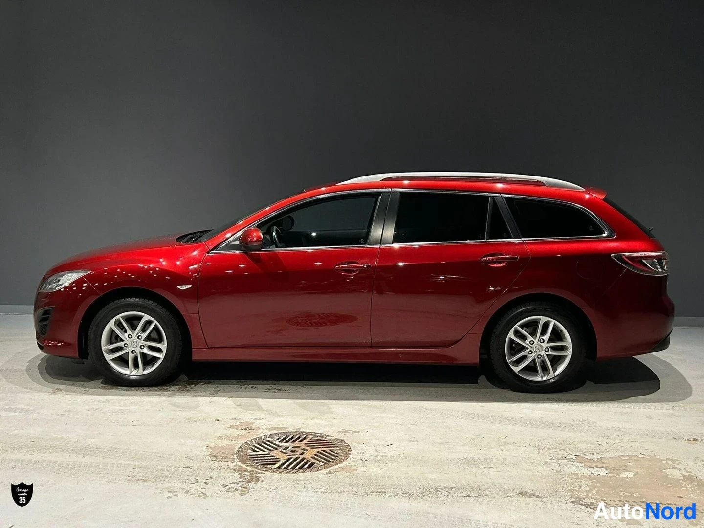 Punainen Mazda 6 2011, sivulta, kuva 4
