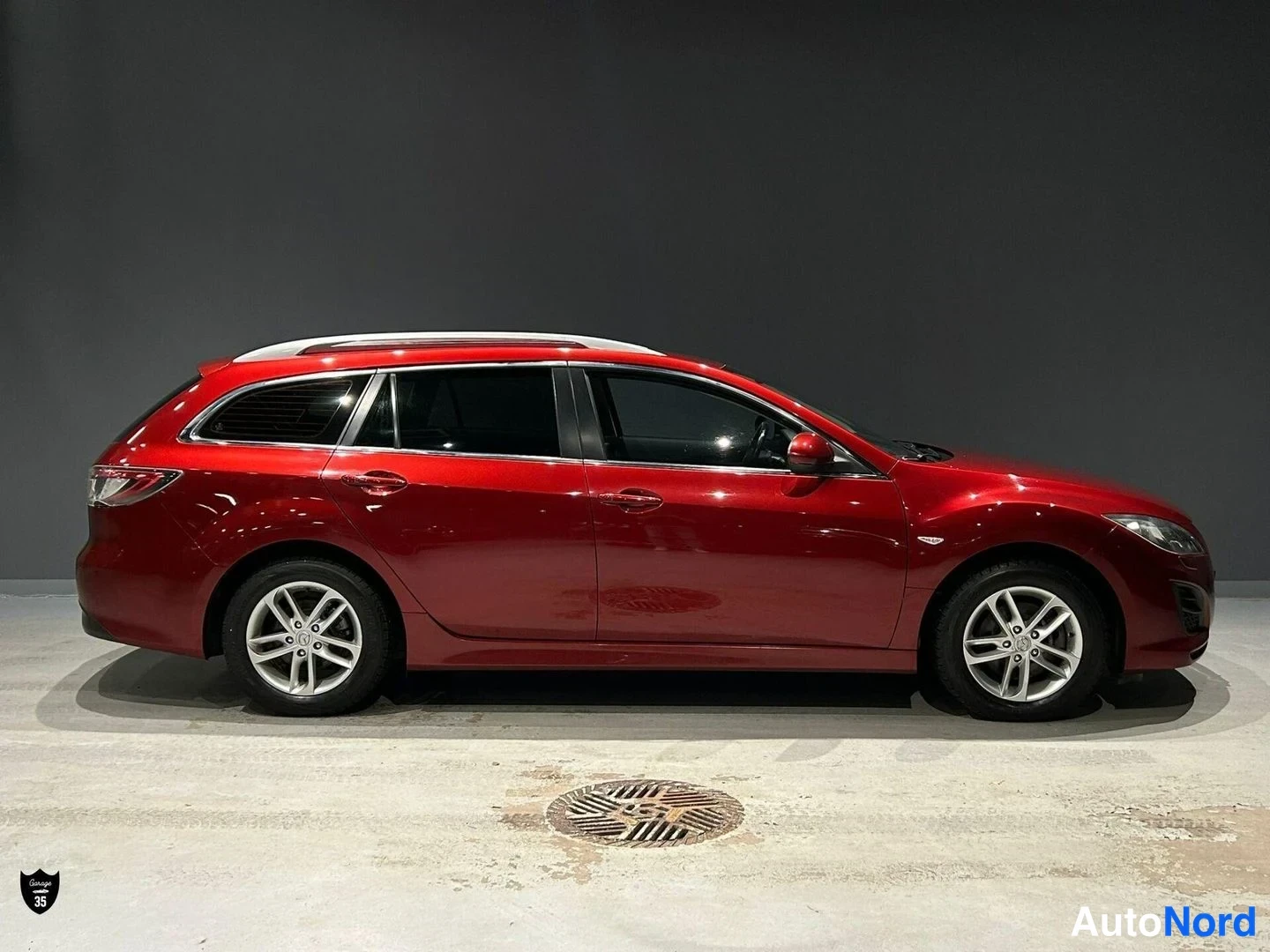 Punainen Mazda 6 2011, sivulta, kuva 5