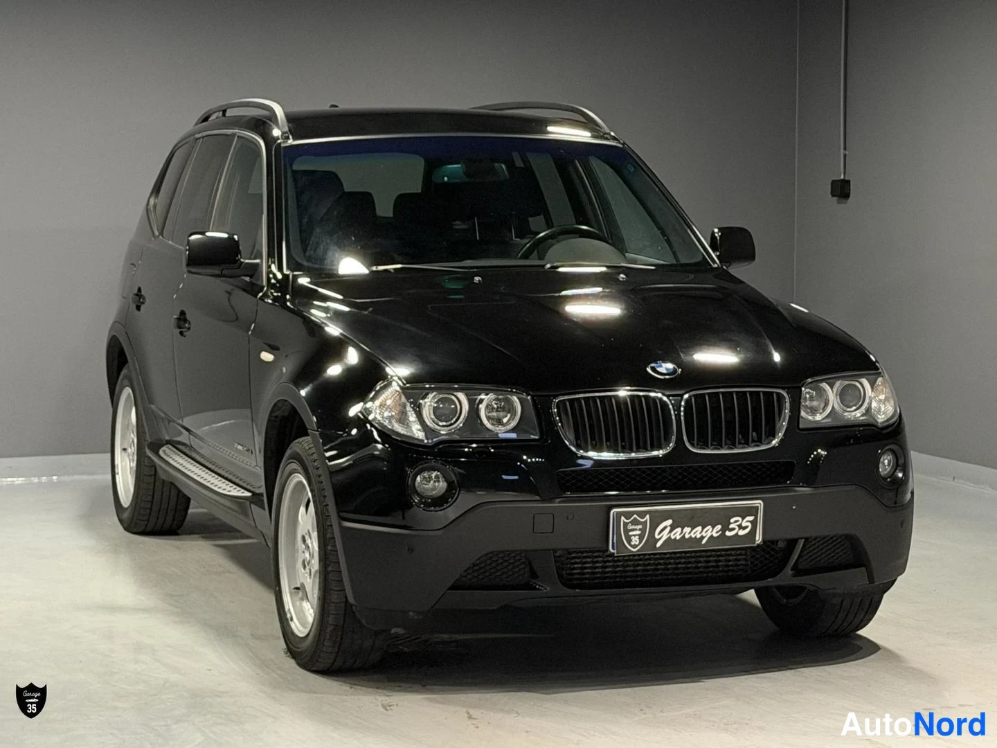 Musta BMW X3 xDrive20d 2008, etuviisto, keula oikealle, kuva 2