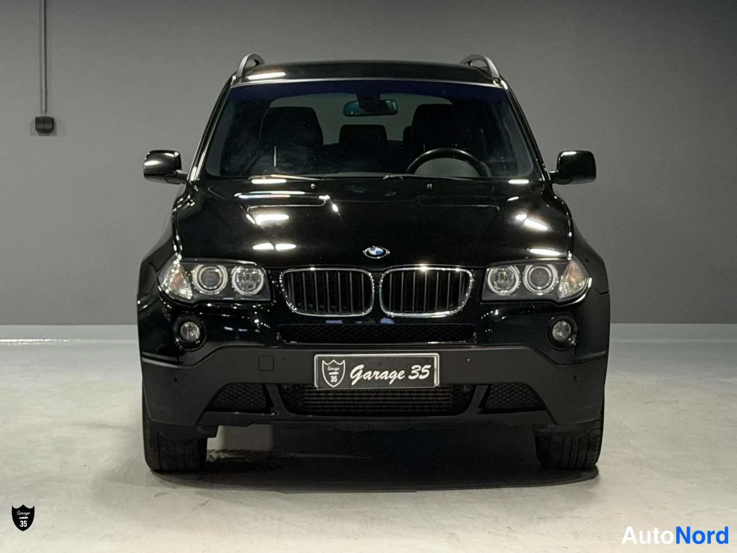 Musta BMW X3 xDrive20d 2008, edestä, kuva 4