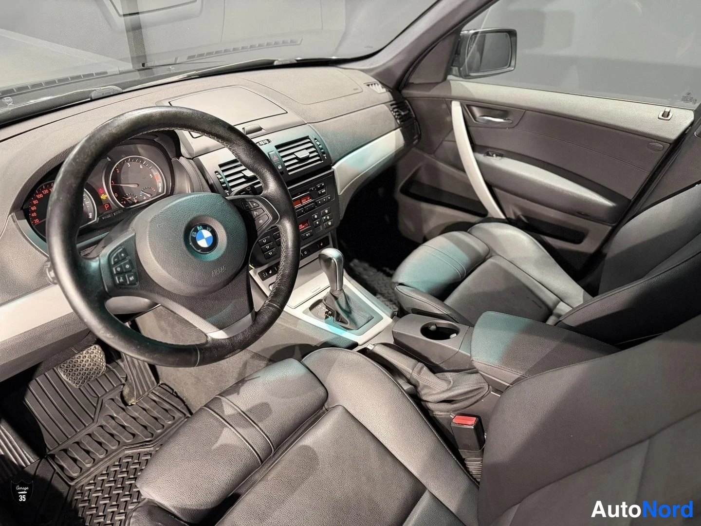 Musta BMW X3 xDrive20d 2008, ohjaamo, kuva 13
