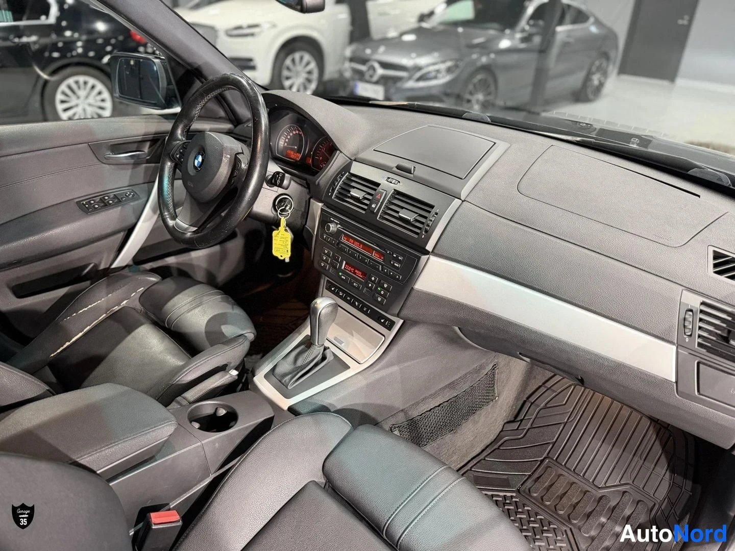 Musta BMW X3 xDrive20d 2008, ohjaamo, kuva 11