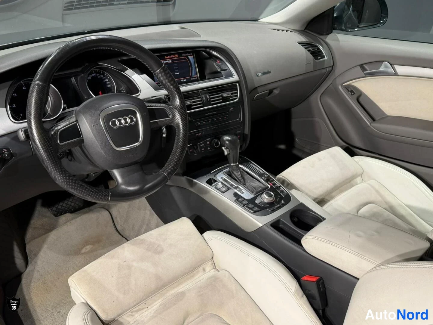 Harmaa Audi a5 Coupe 2008, ohjaamo, kuva 10