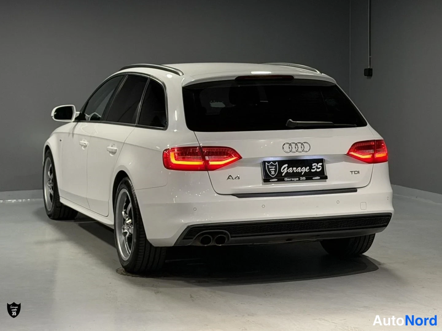 Valkoinen Audi A4 Avant 2014, takaviisto, kuva 7