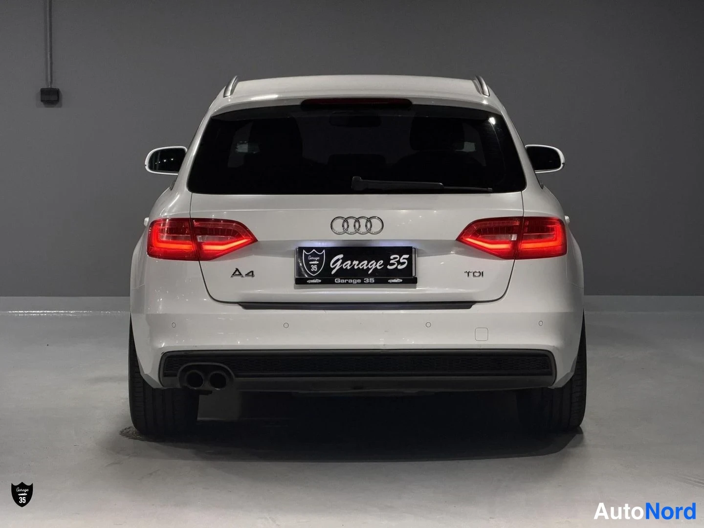 Valkoinen Audi A4 Avant 2014, takaa, kuva 10