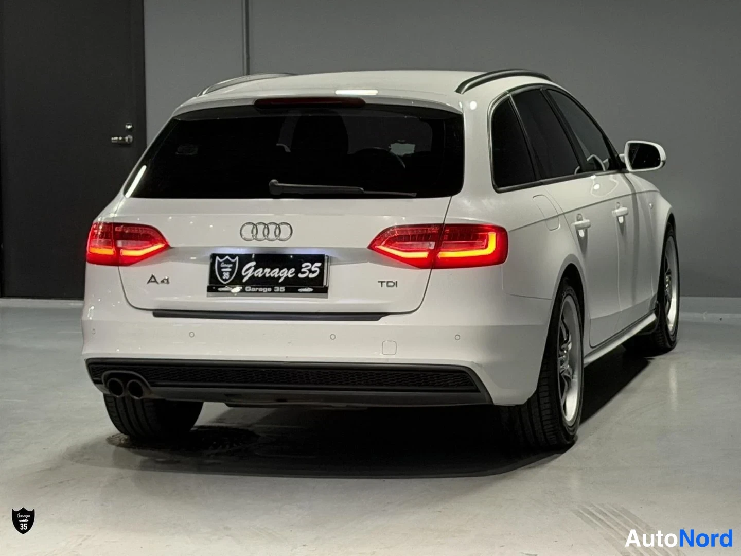 Valkoinen Audi A4 Avant 2014, takaviisto, kuva 8