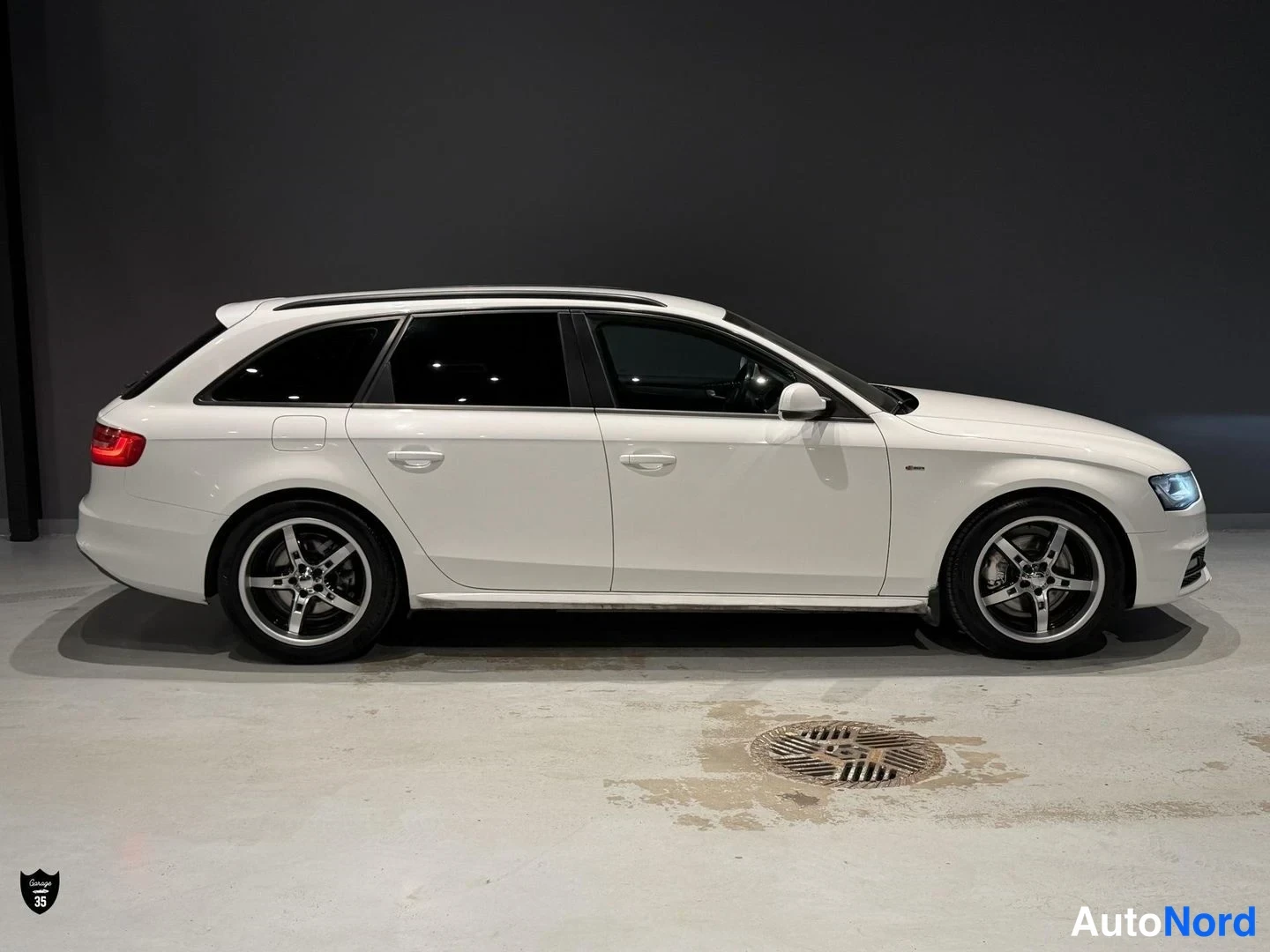 Valkoinen Audi A4 Avant 2014, etuviisto, keula oikealle, kuva 4