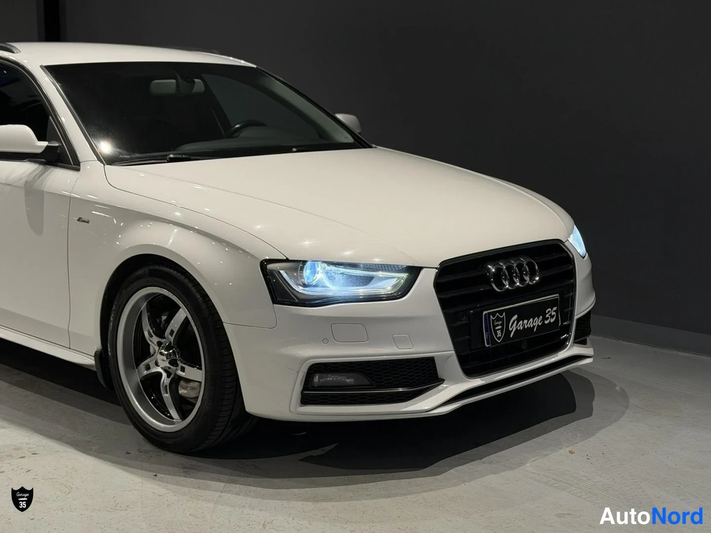 Valkoinen Audi A4 Avant 2014, etuviisto, keula oikealle, kuva 5