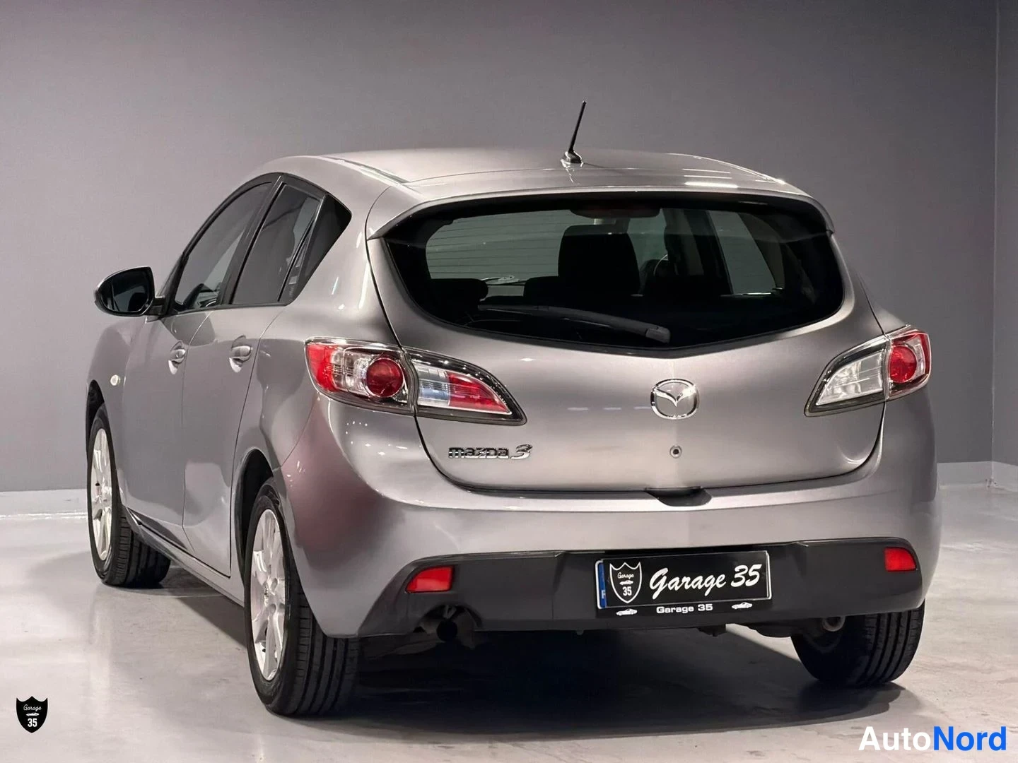 Harmaa Mazda 3 2011, takaviisto, kuva 6