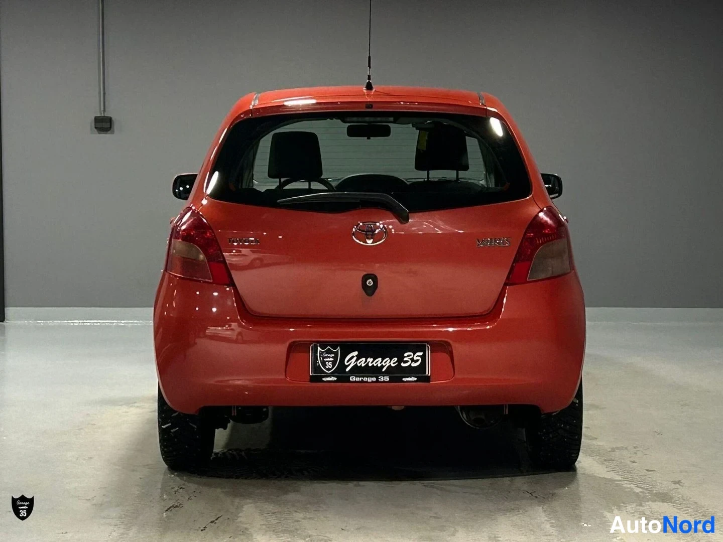 Oranssi Toyota Yaris 2006, takaa, kuva 8