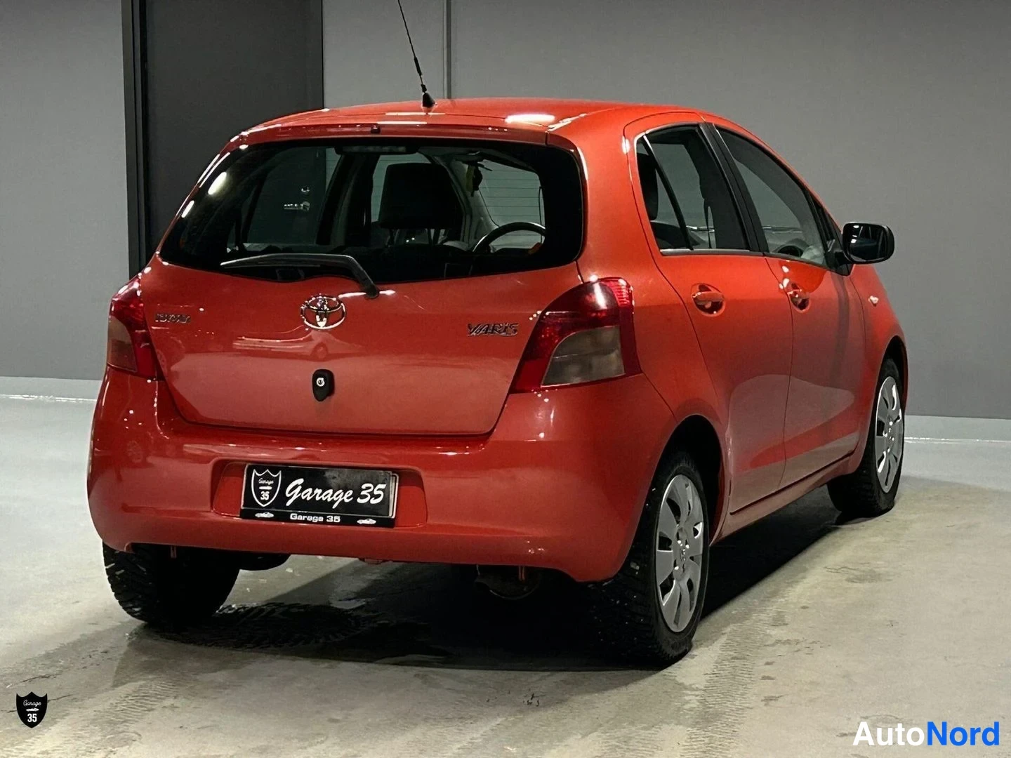 Oranssi Toyota Yaris 2006, takaviisto, kuva 7