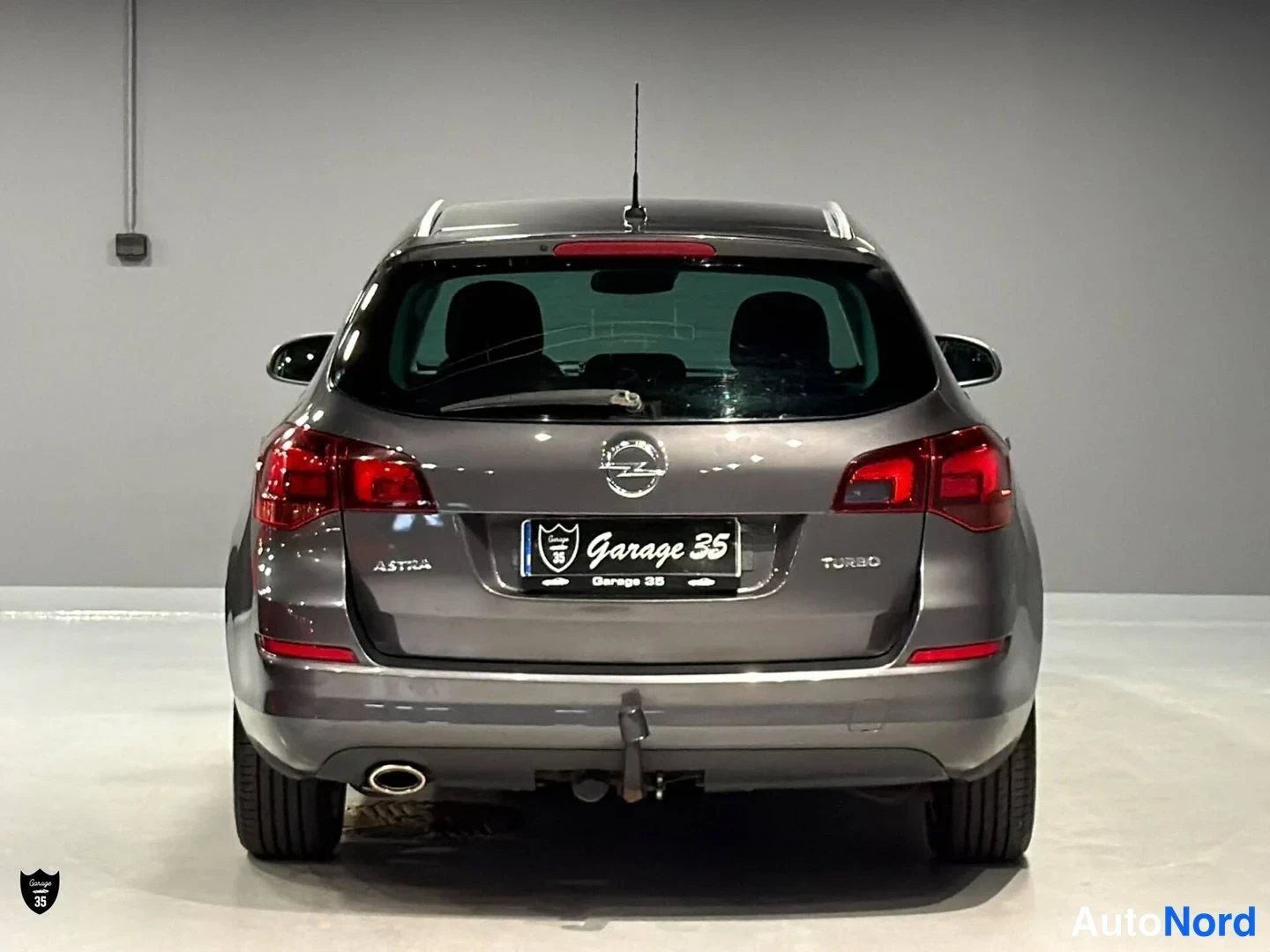 Harmaa Opel Astra 2011, takaa, kuva 8