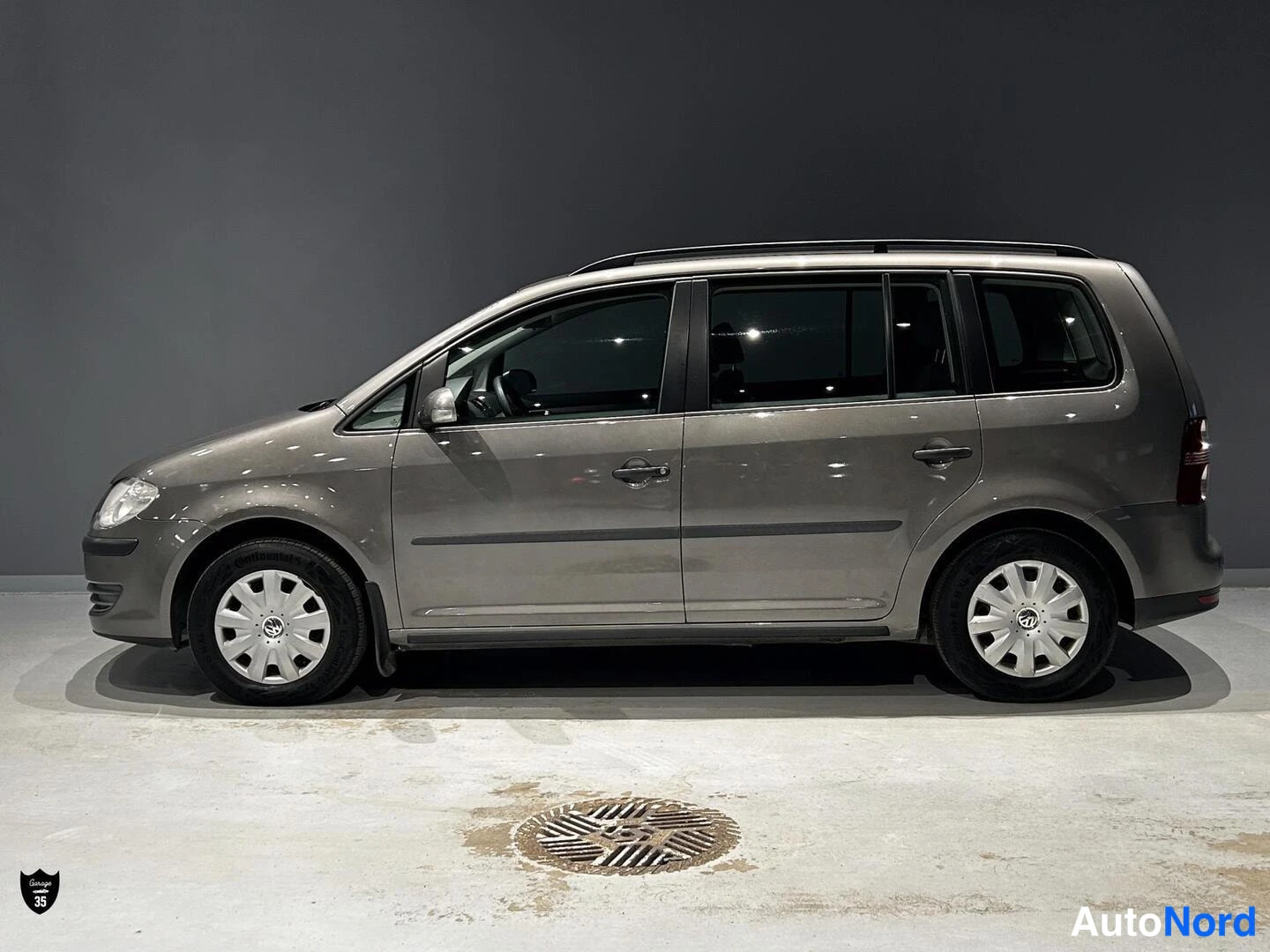 Harmaa Volkswagen Touran 2007, sivulta, kuva 4