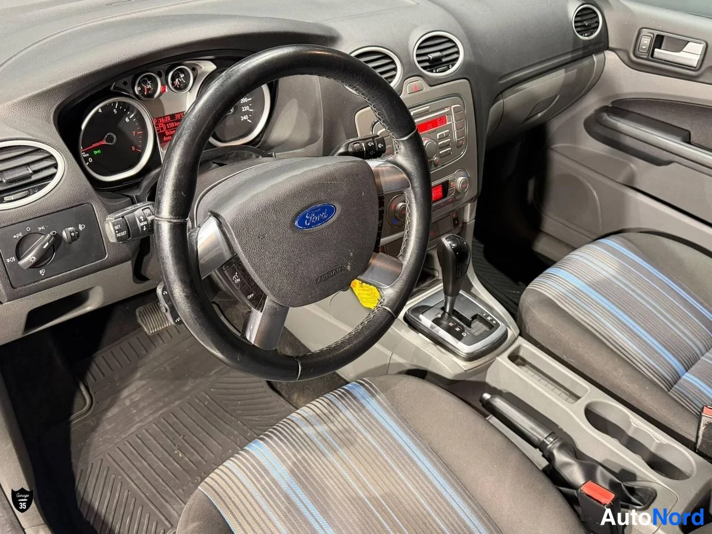 Valkoinen Ford Focus 2009, ohjaamo, kuva 12