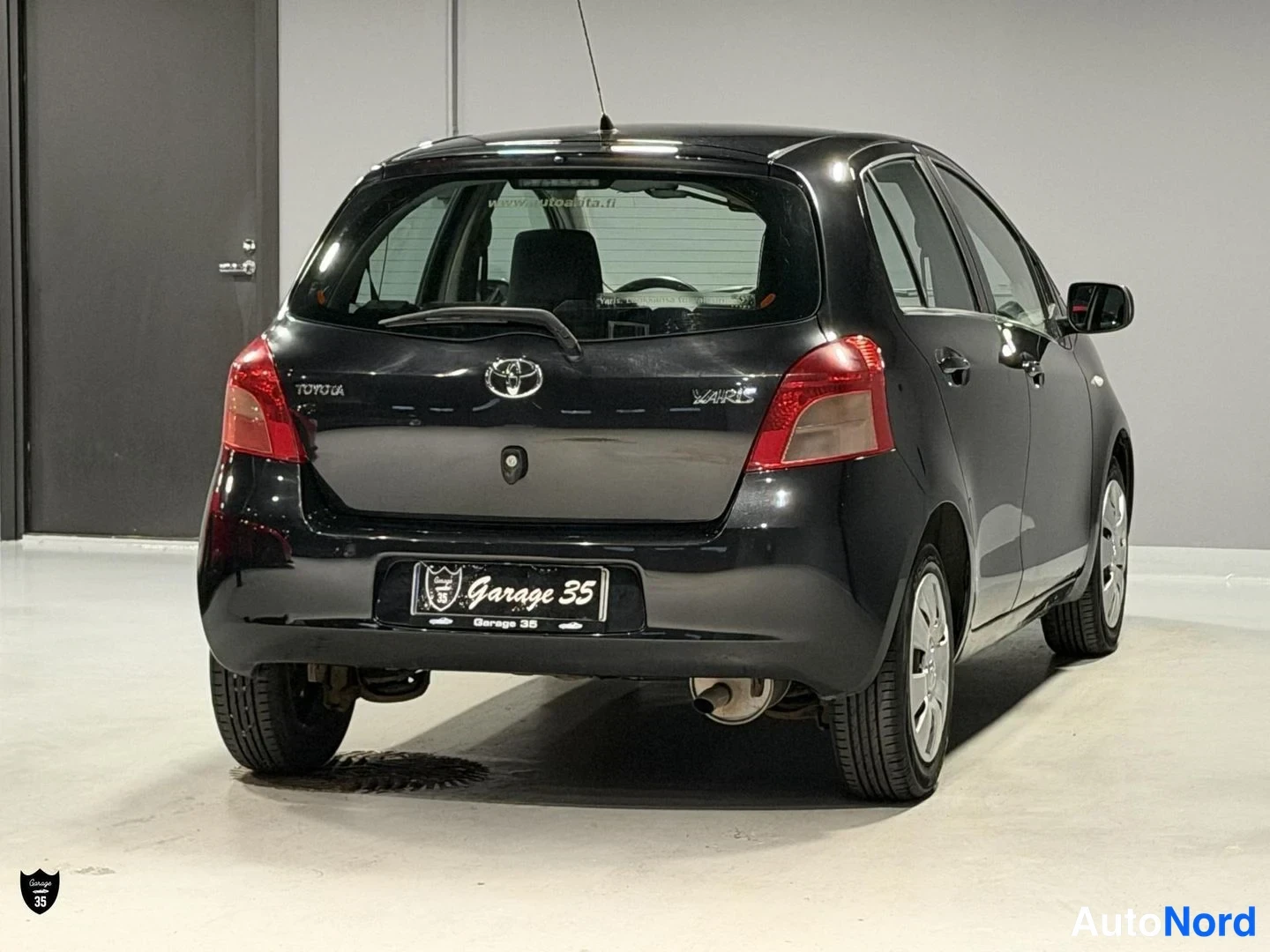Musta Toyota Yaris 2006, takaviisto, kuva 7