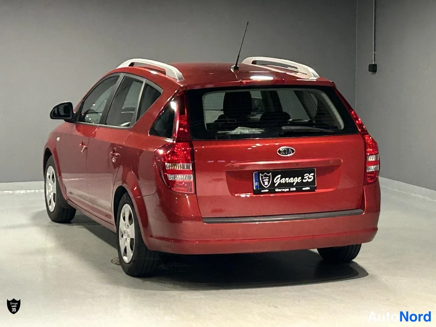 Punainen Kia Ceed SW 2009, takaviisto, kuva 6