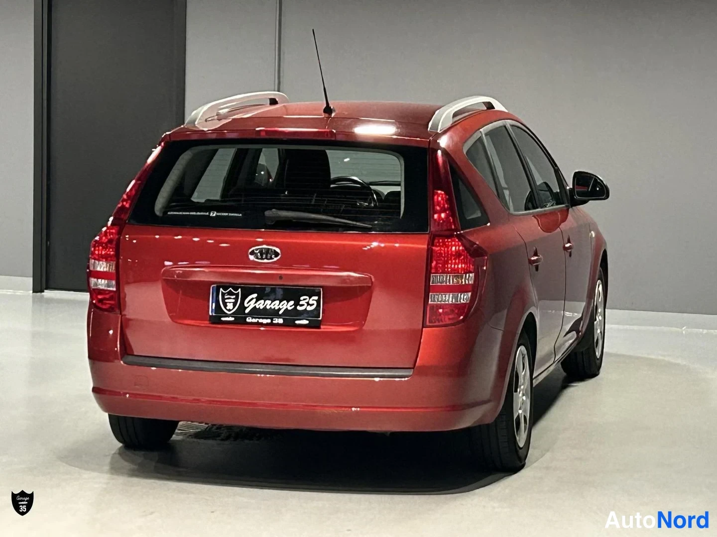 Punainen Kia Ceed SW 2009, takaviisto, kuva 7
