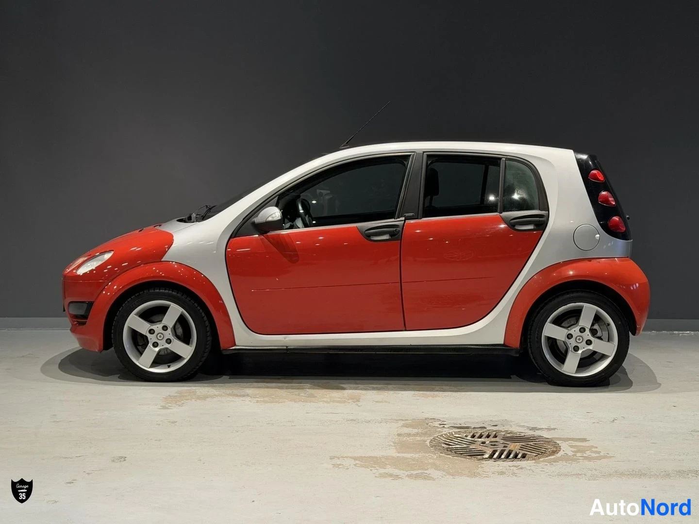 Punainen Smart FORFOUR 1.3 2005, etuviisto, keula vasemmalle, kuva 2