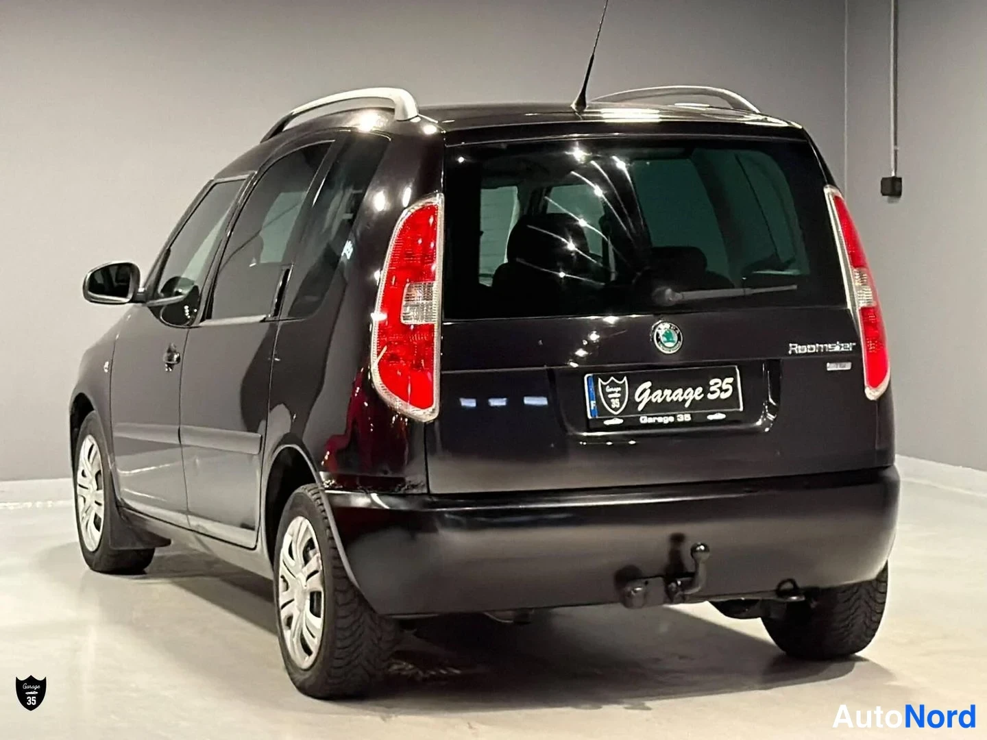 Musta Skoda Roomster 2011, takaviisto, kuva 6