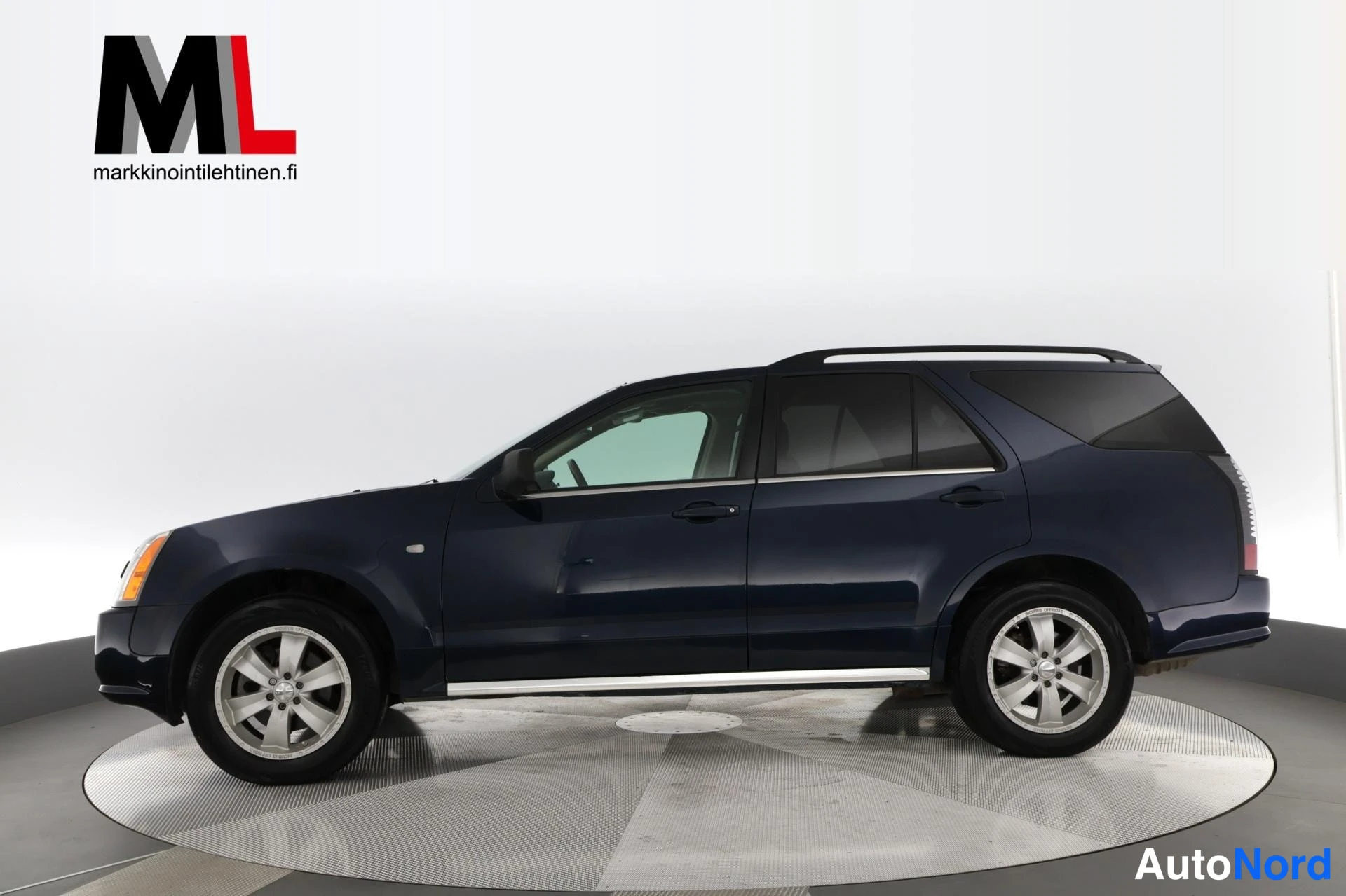 Sininen Cadillac SRX 2004, sivulta, kuva 3