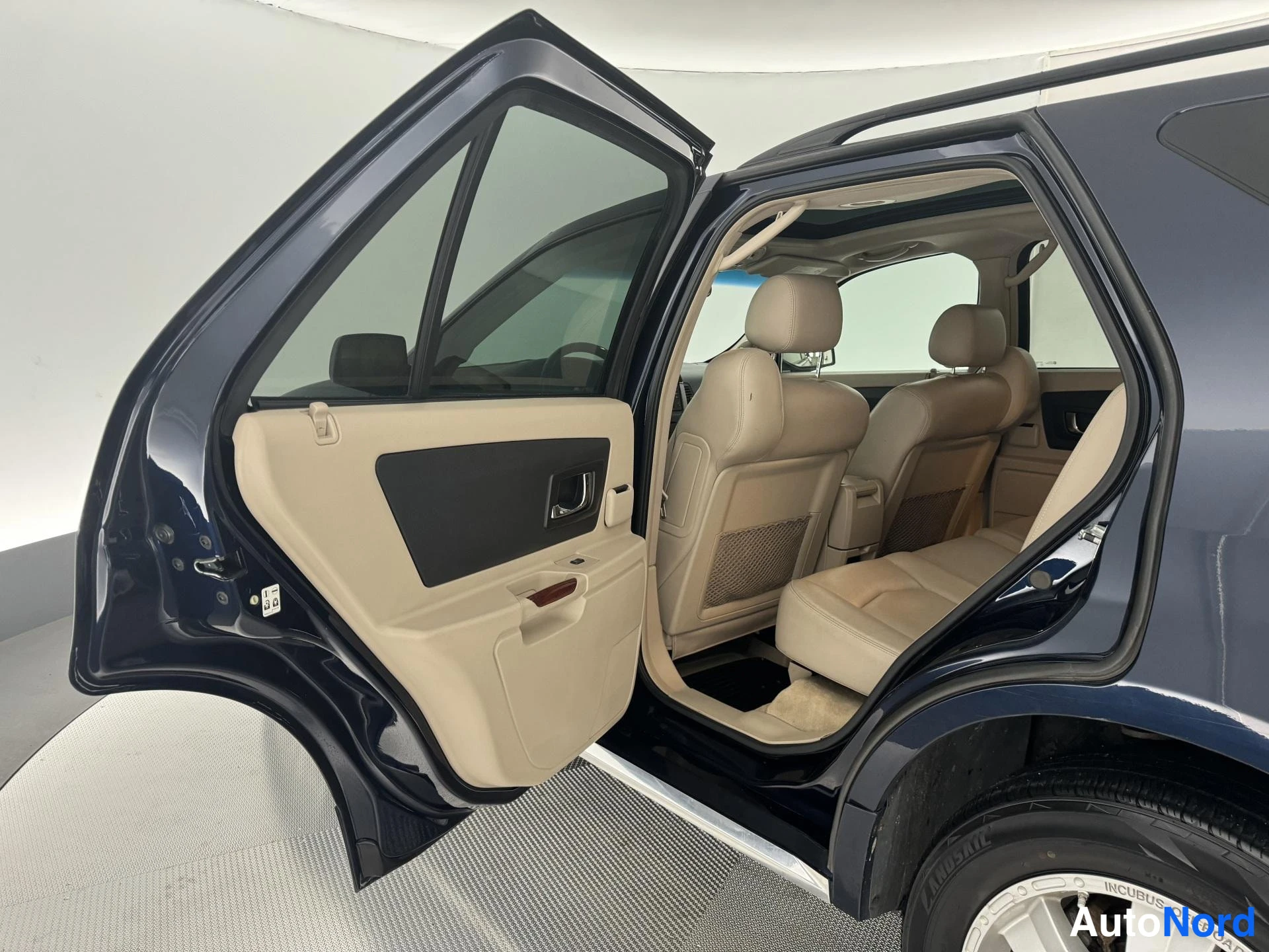 Sininen Cadillac SRX 2004, takaistuimet, kuva 18