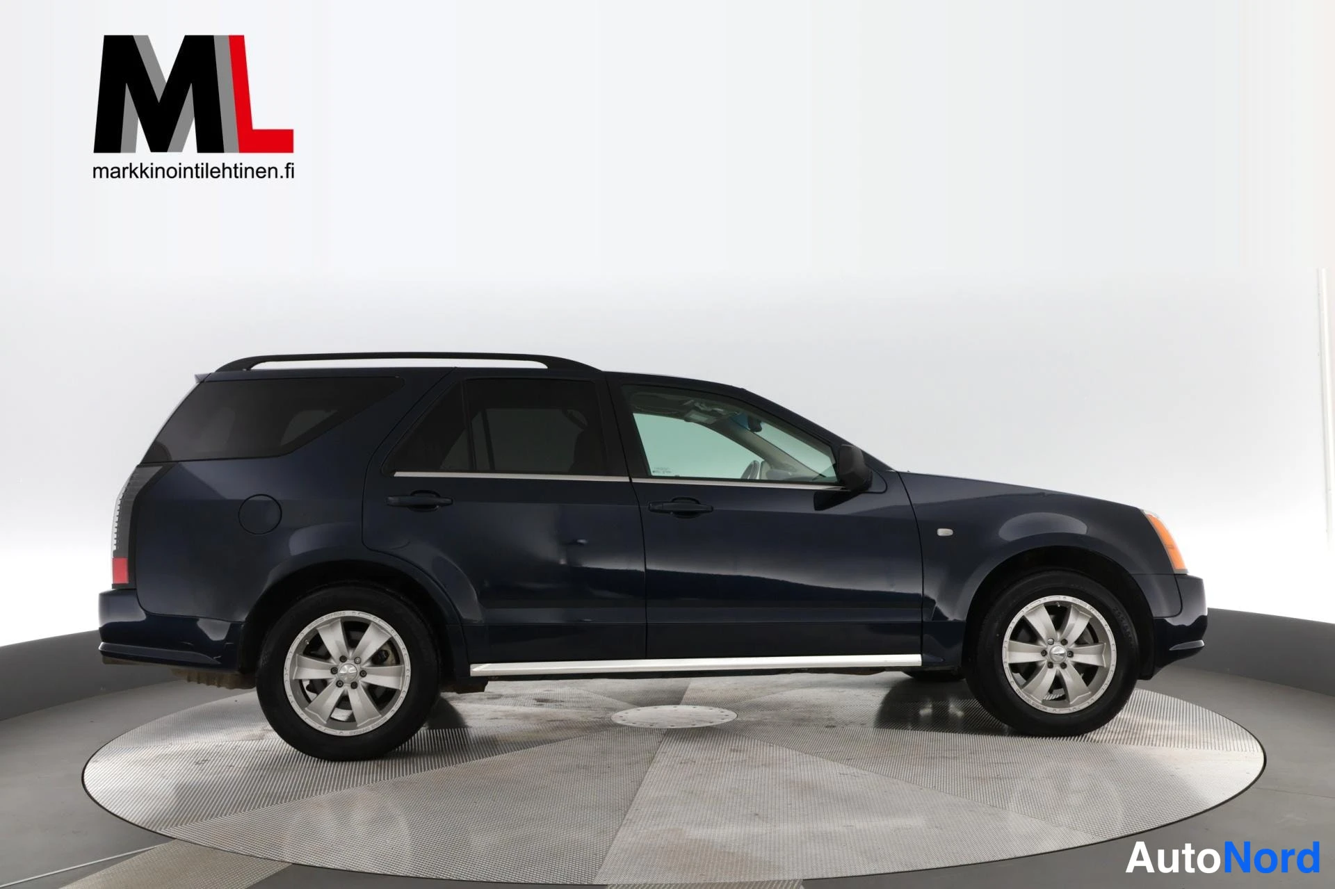 Sininen Cadillac SRX 2004, sivulta, kuva 4