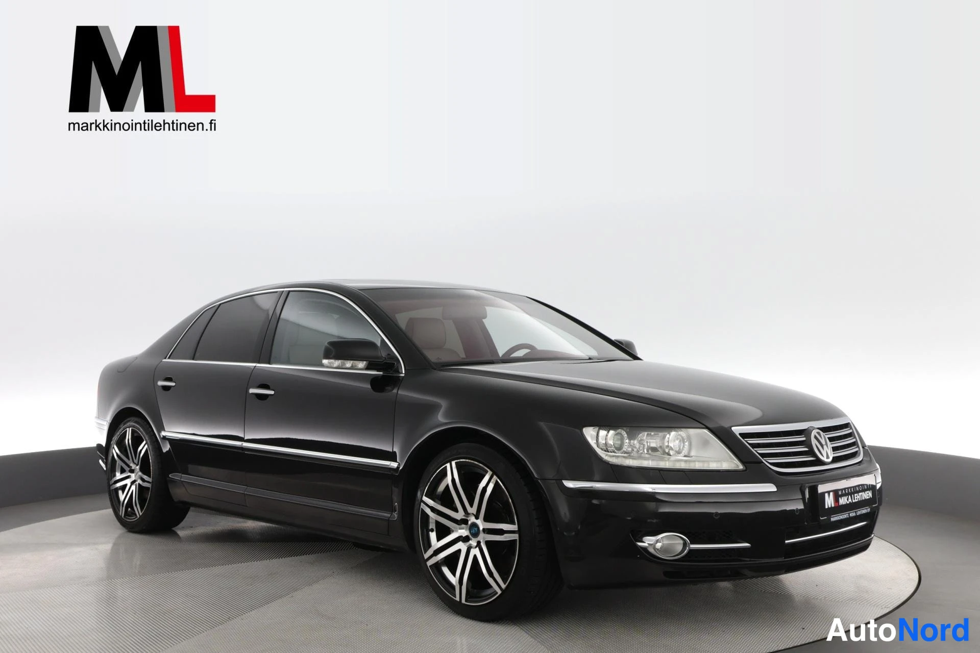 Musta Volkswagen Phaeton 2009, etuviisto, keula oikealle, kuva 3