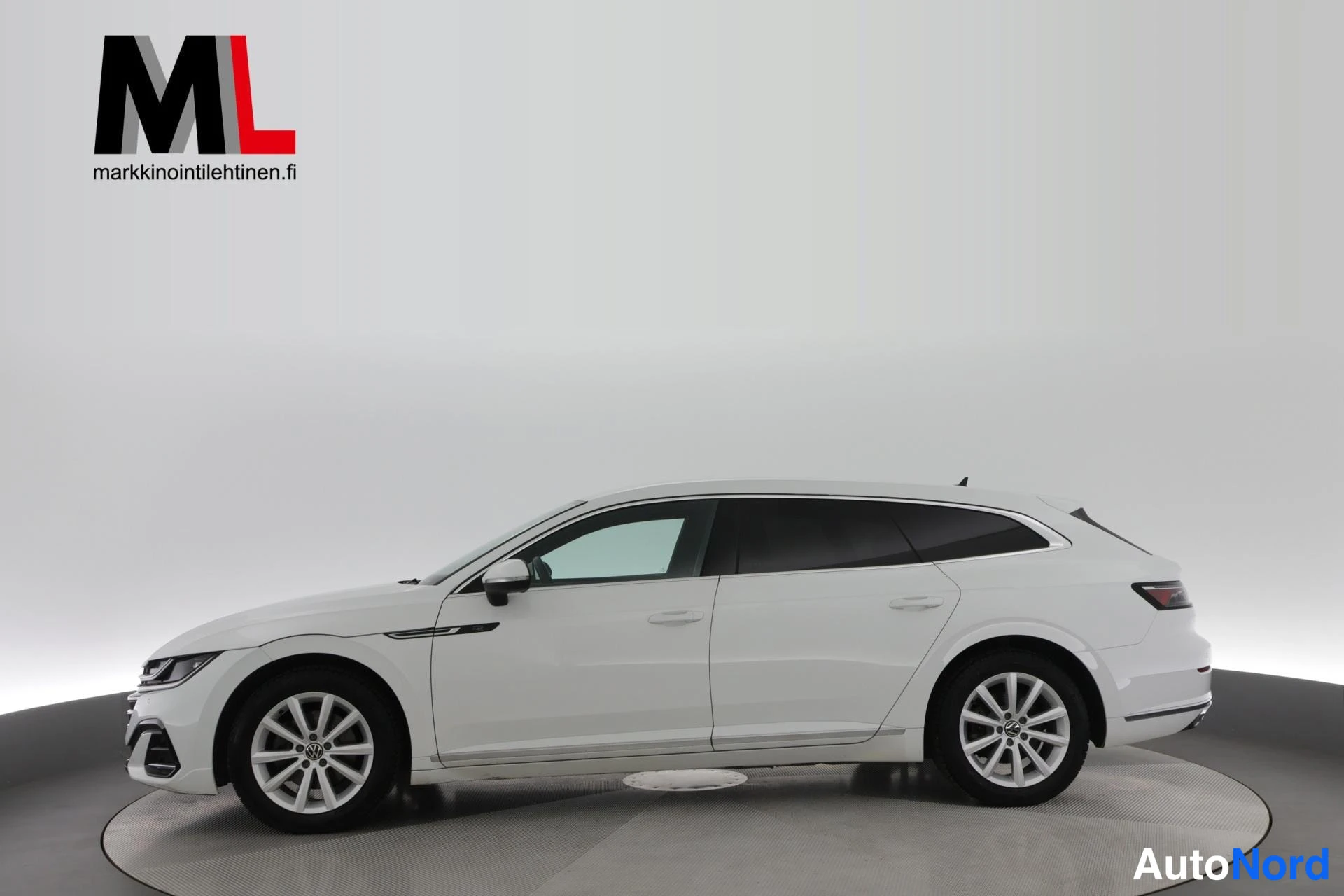 Valkoinen Volkswagen Arteon 2021, sivulta, kuva 5
