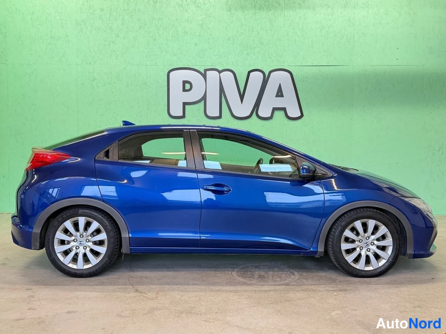 Sininen Honda Civic 2012, sivulta, kuva 3