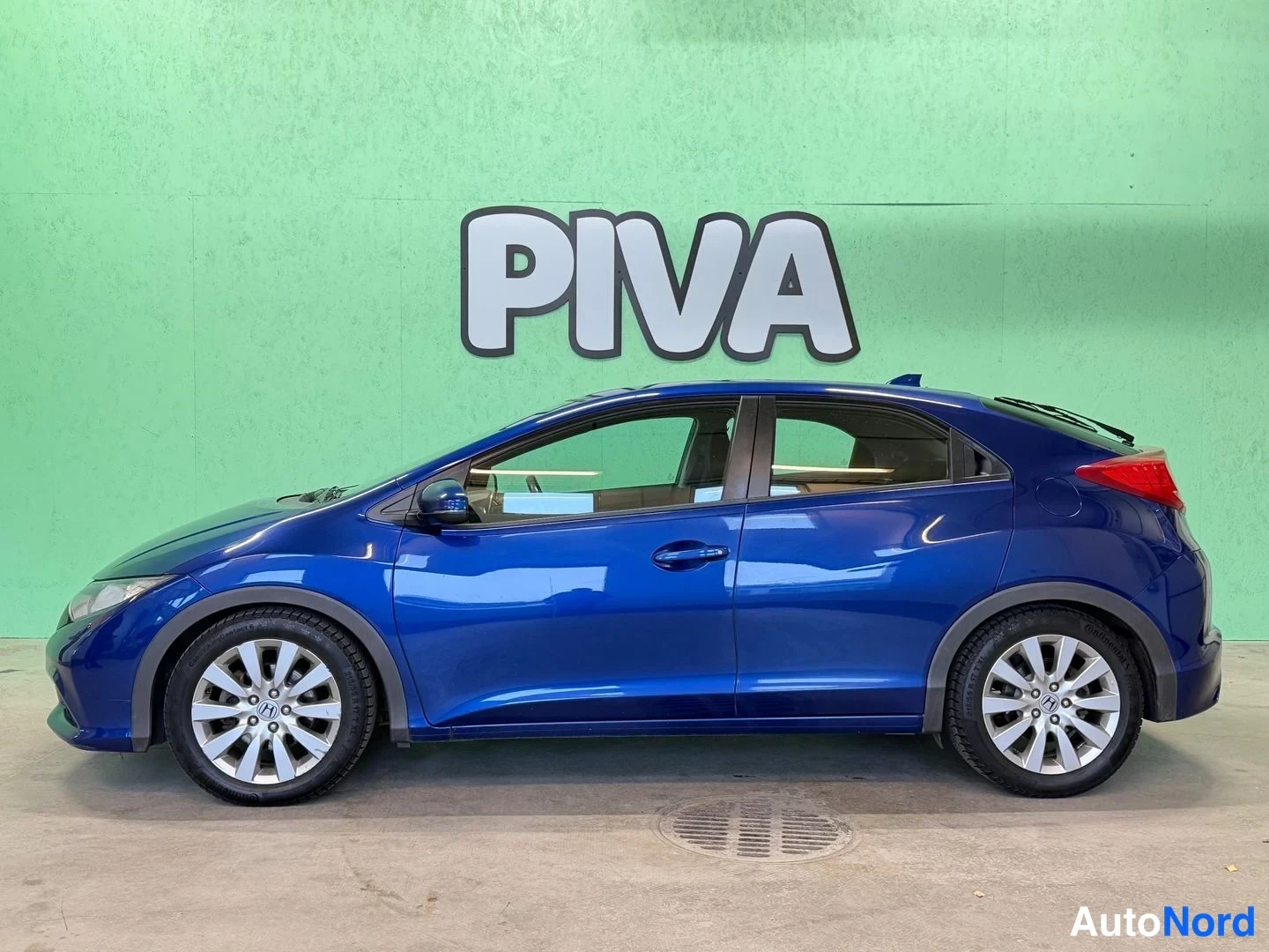 Sininen Honda Civic 2012, sivulta, kuva 4