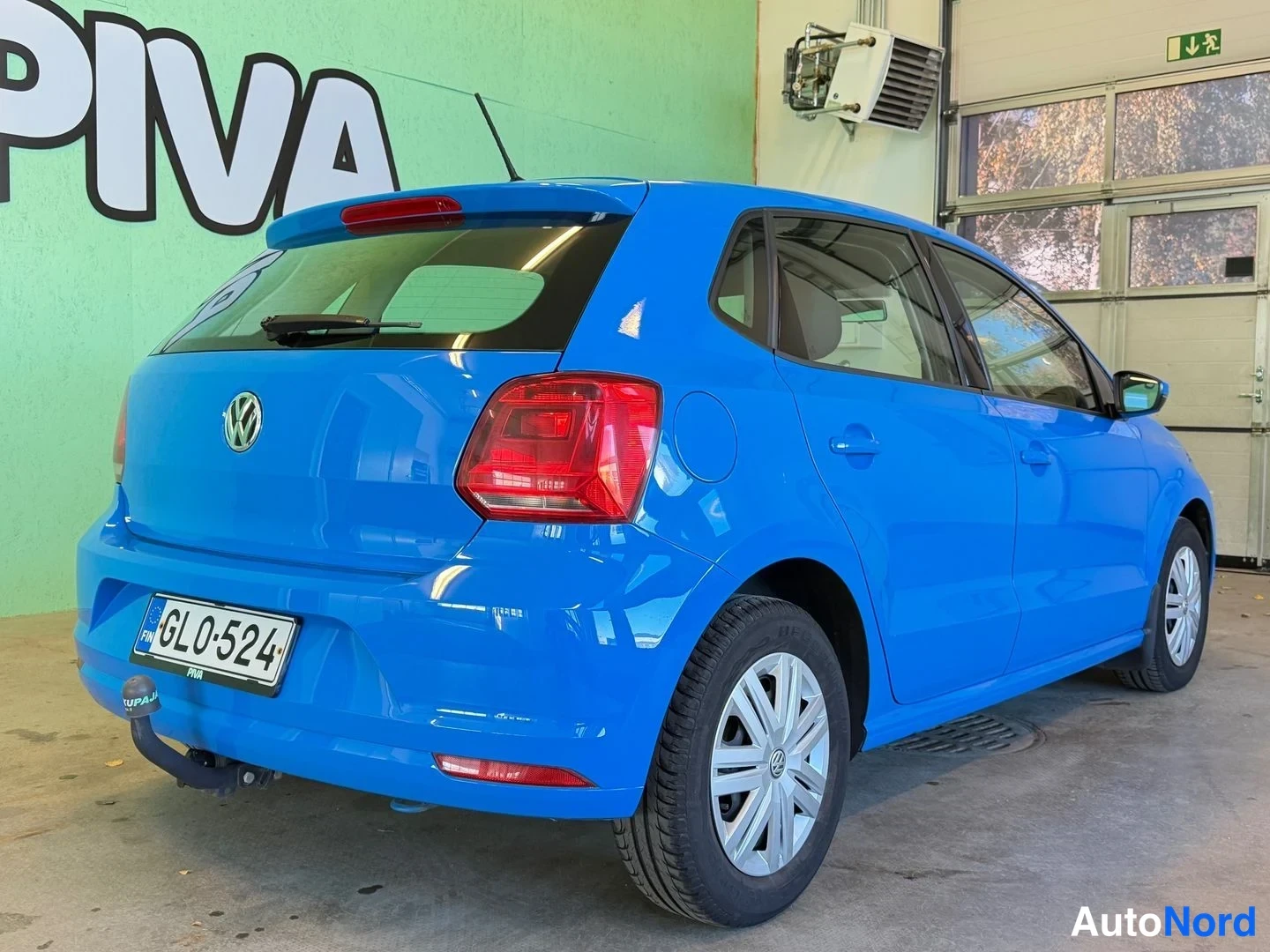 Sininen Volkswagen Polo 2015, takaviisto, kuva 7