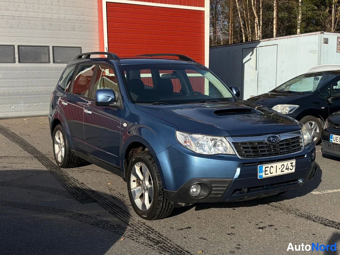 Sininen Subaru Forester 2009, etuviisto, keula oikealle, kuva 2