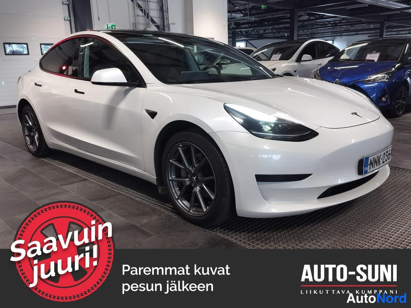 Valkoinen Tesla Model 3 2023, etuviisto, keula oikealle, kuva 2
