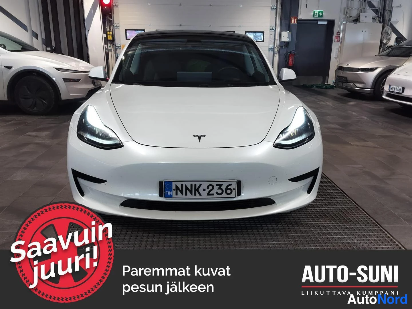 Valkoinen Tesla Model 3 2023, edestä, kuva 3