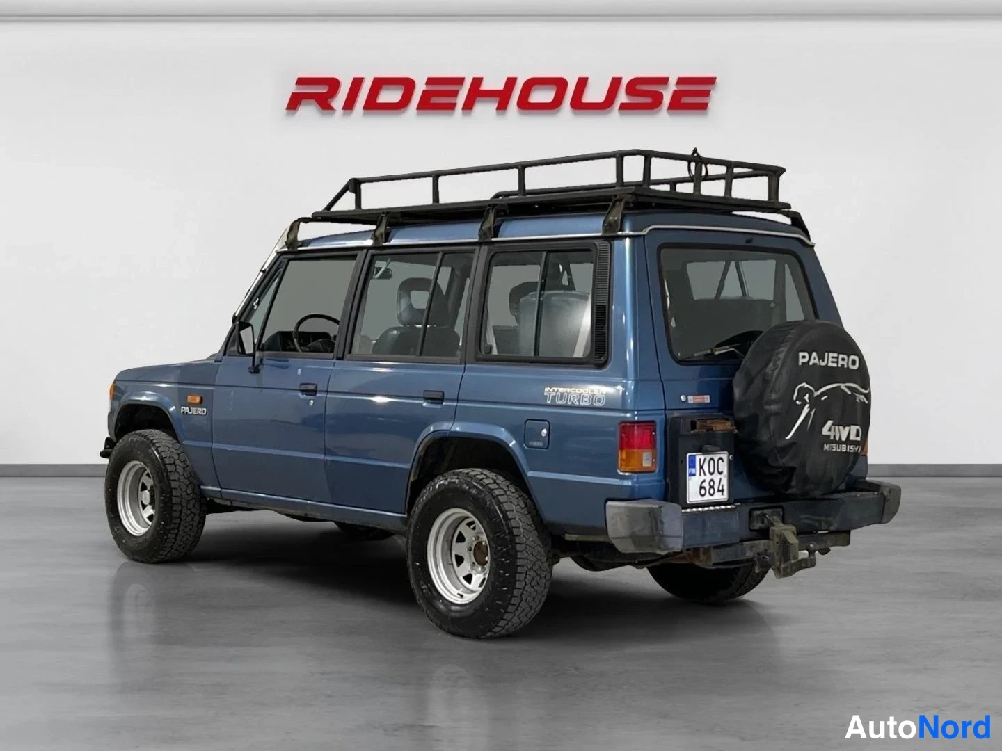Sininen Mitsubishi Pajero 1990, takaviisto, kuva 6