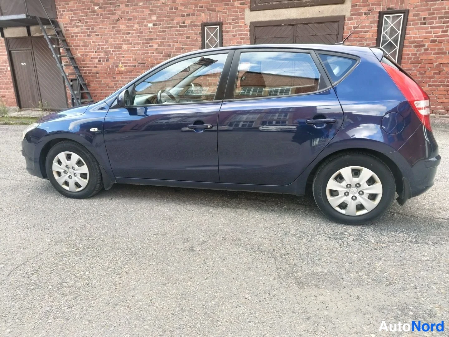 Sininen Hyundai i30 2008, sivulta, kuva 6