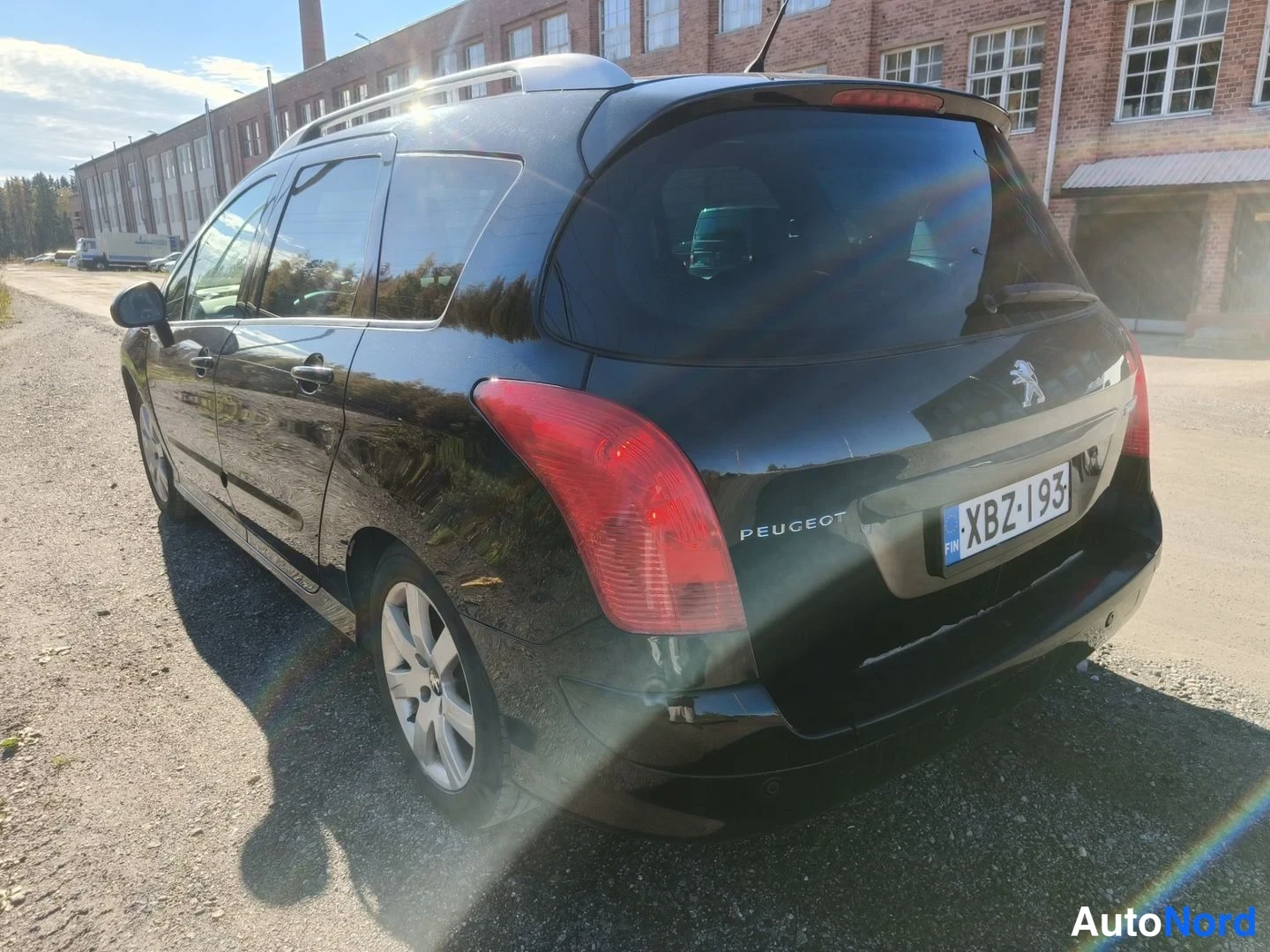 Musta Peugeot 308 2011, takaviisto, kuva 4