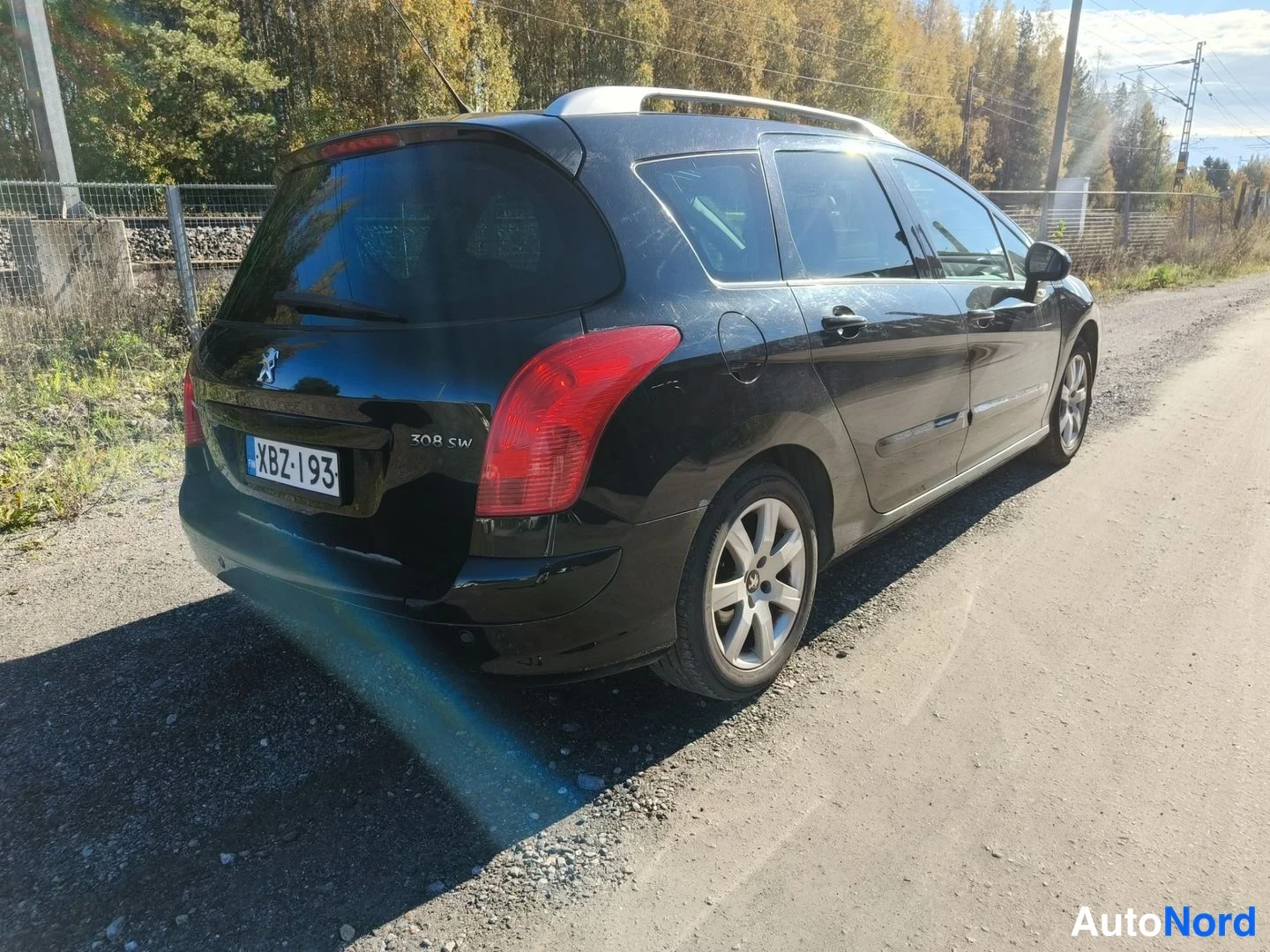 Musta Peugeot 308 2011, takaviisto, kuva 5