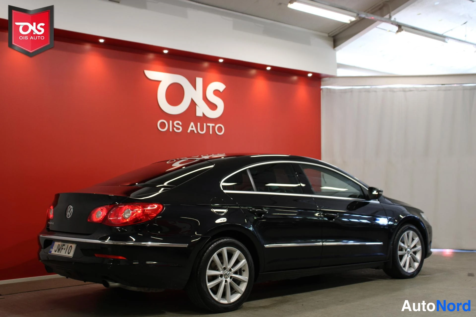 Musta Volkswagen Passat 2009, takaviisto, kuva 5
