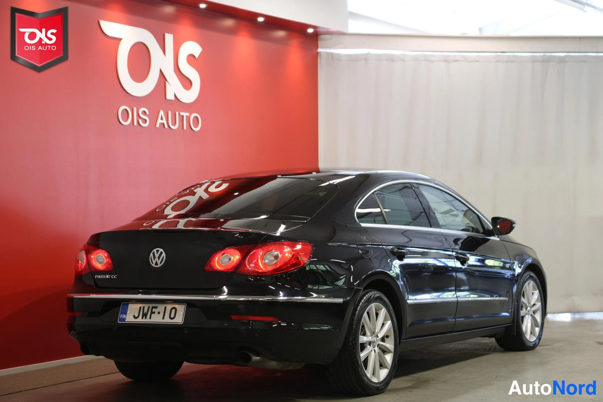 Musta Volkswagen Passat 2009, takaviisto, kuva 6