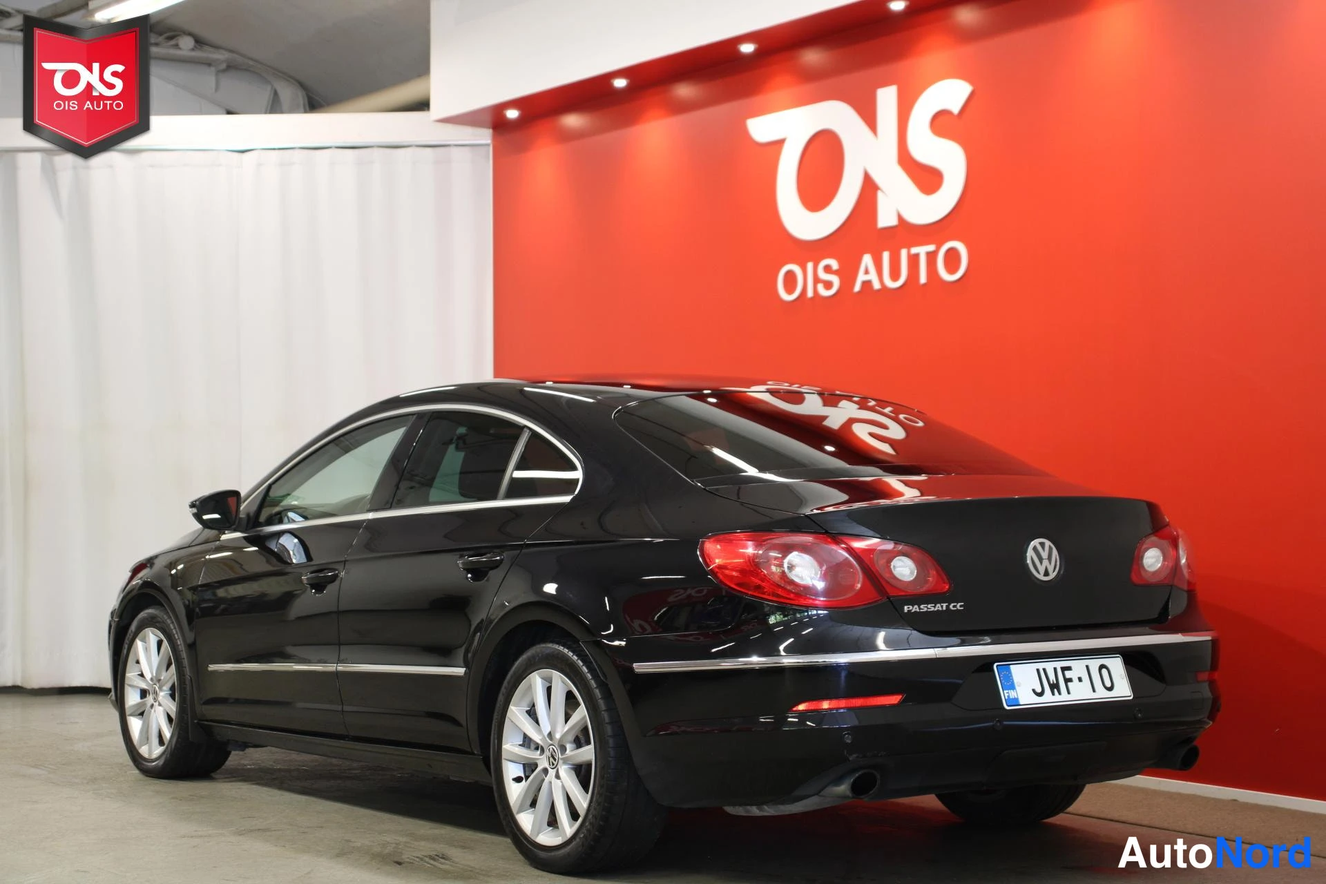 Musta Volkswagen Passat 2009, takaviisto, kuva 7