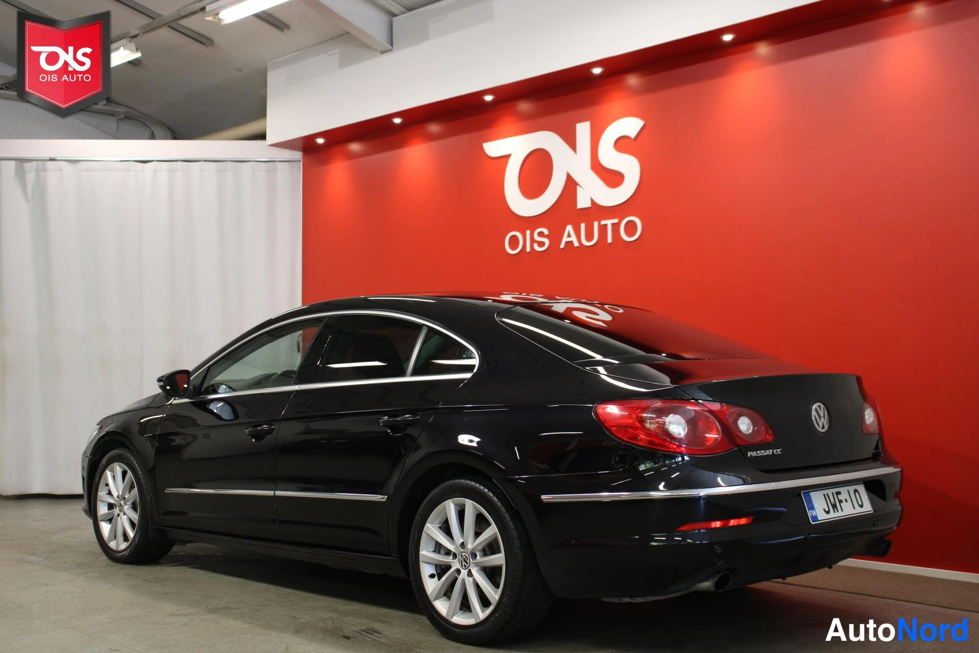 Musta Volkswagen Passat 2009, takaviisto, kuva 8