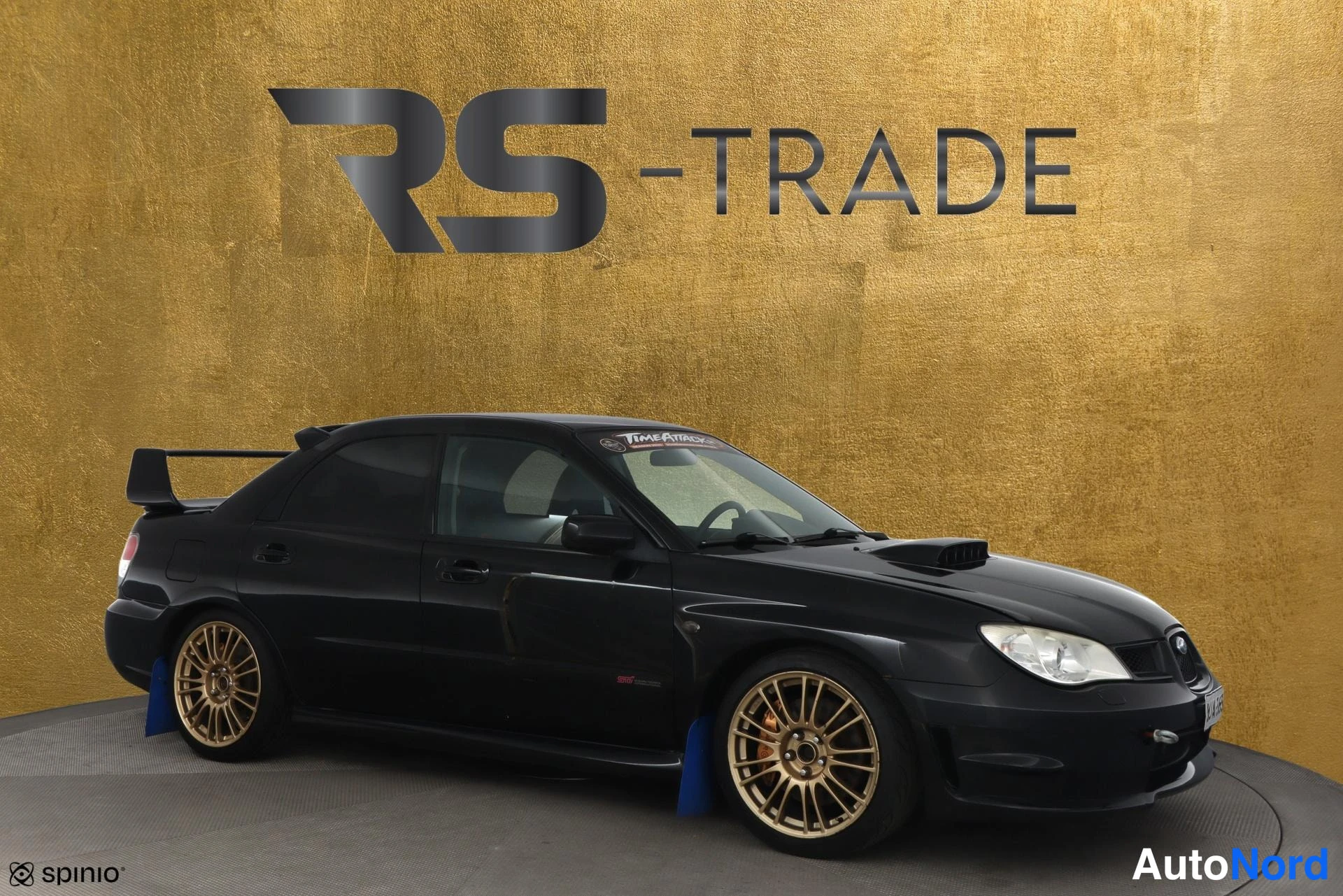 Musta Subaru Impreza 2007, etuviisto, keula oikealle, kuva 2