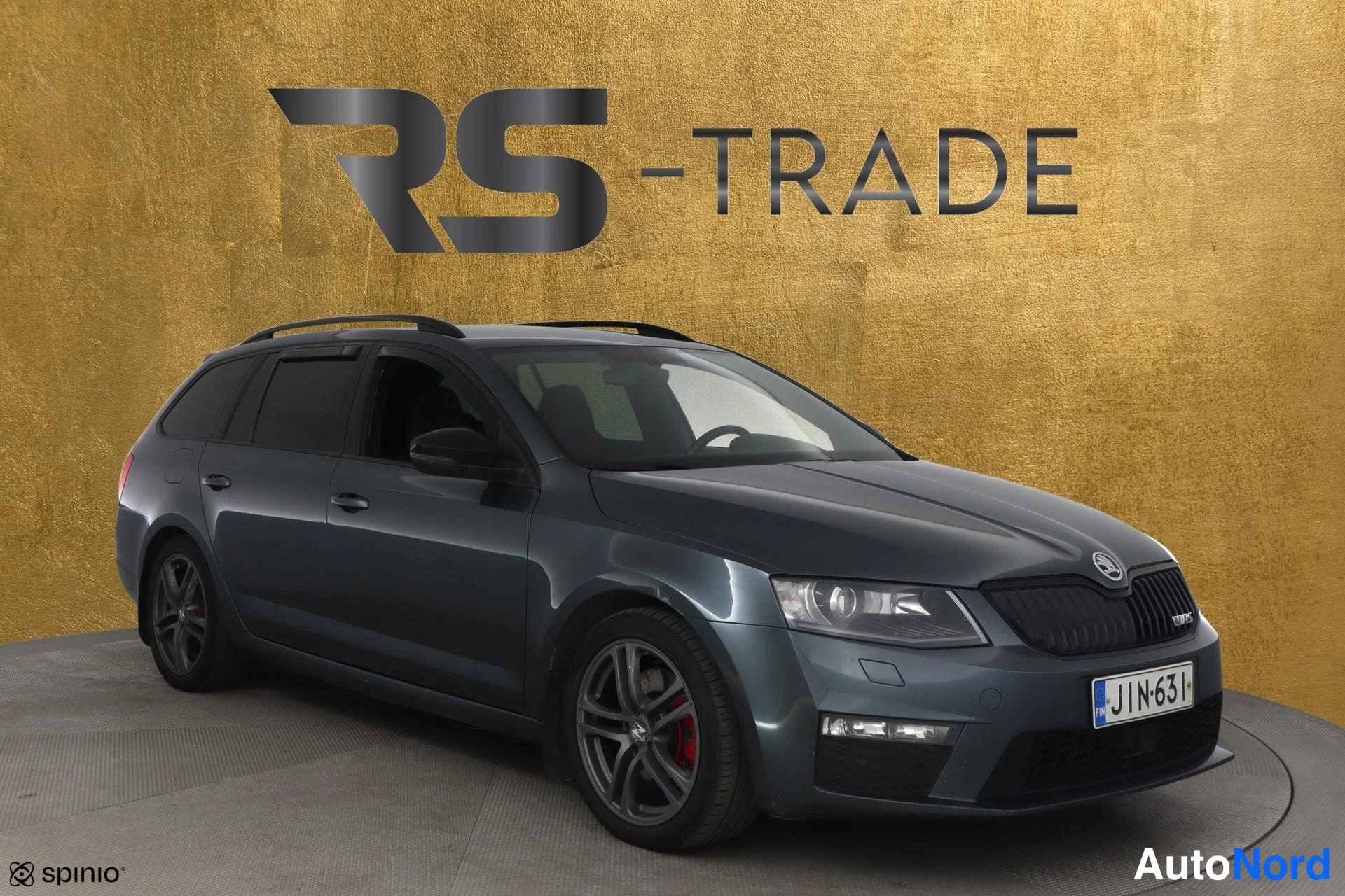 Grey Skoda Octavia 2016, front three-quarter, nose to the right, photo 3
